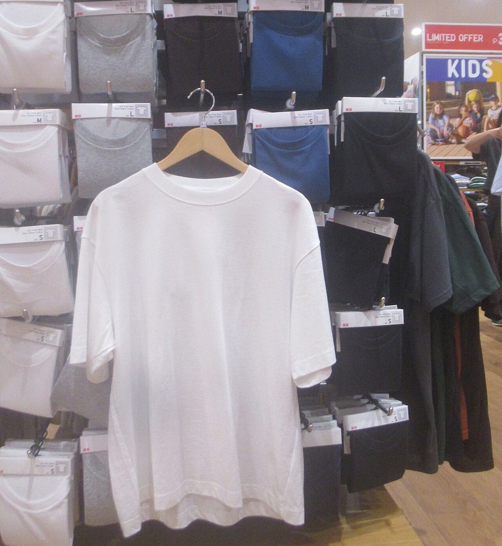 White crew neck T-shirt on a hanger